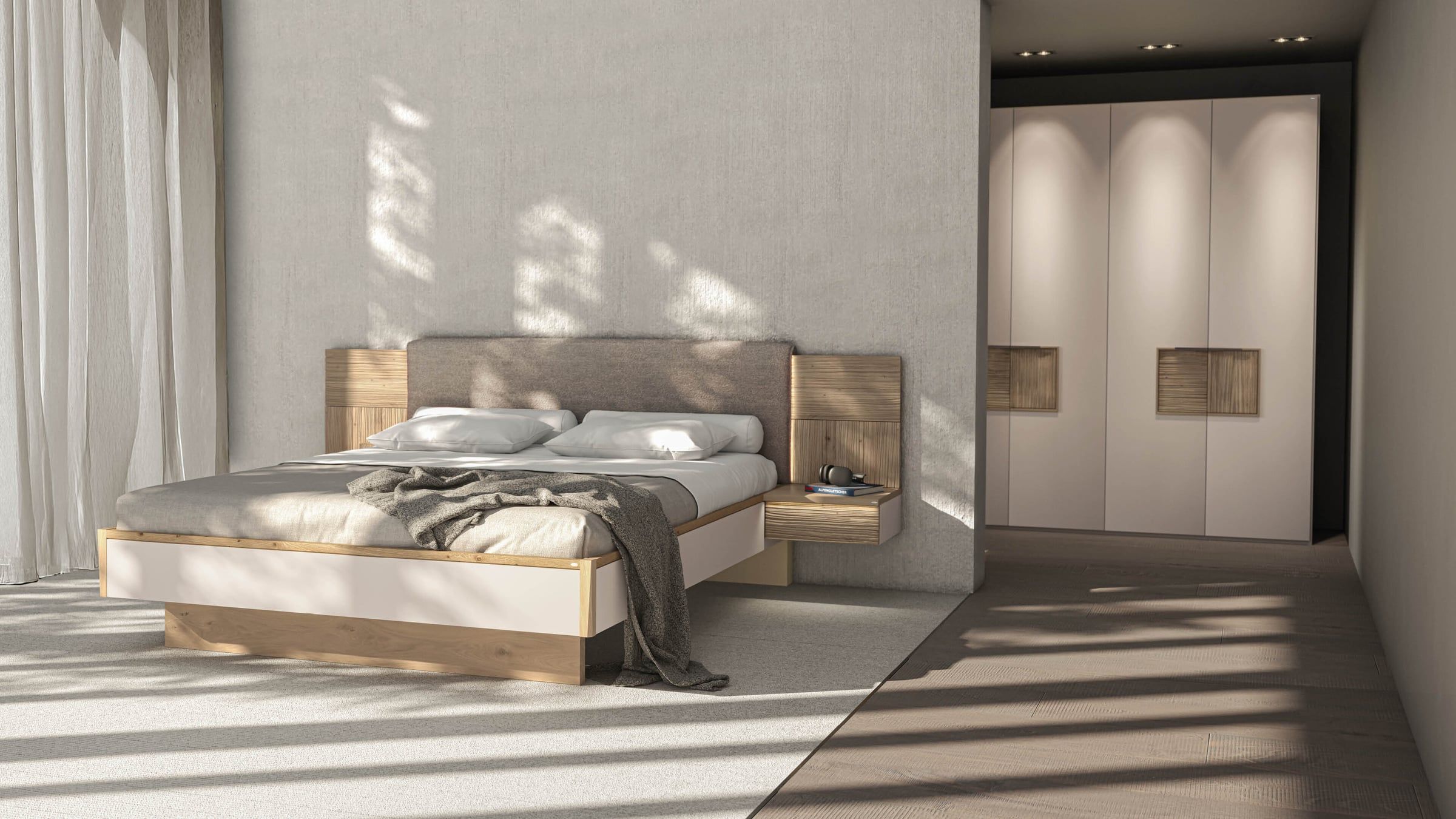 Schlafzimmer in Creme und Eiche mit Bett, Nachttischen und Kleiderschrank mit Holzgriffmulden